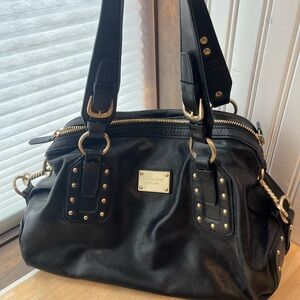 Michael Kors black pebble leather studded shoulder bag.
